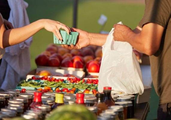 Charlottesville VA Farmers Market, buying fresh tomatoes from farmer