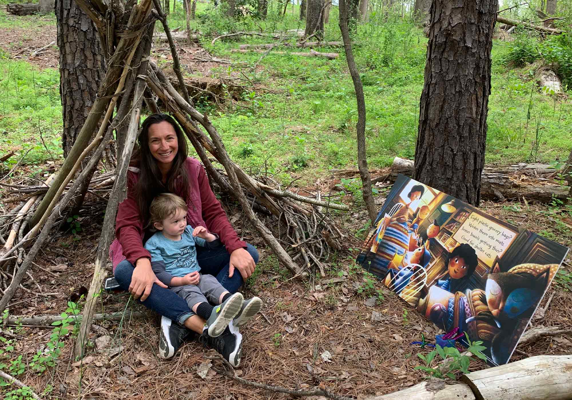 Mother and sun enjoying outdoor story time at Botanical Garden of the Piedmont in Charlottesville, VA